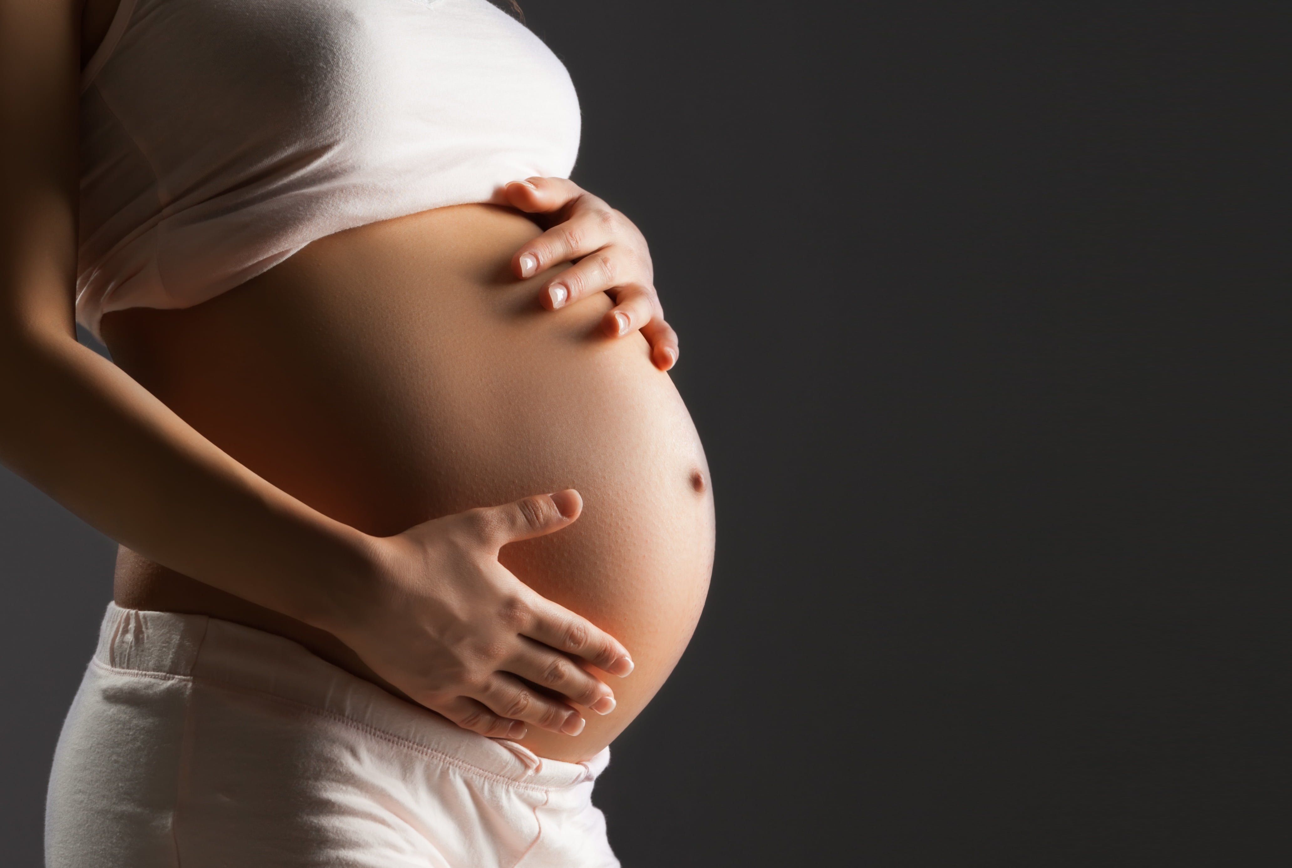 Беременных женщин 60. Беременные женщины. Беременный живот. Беременные животики. Фото беременного живота.